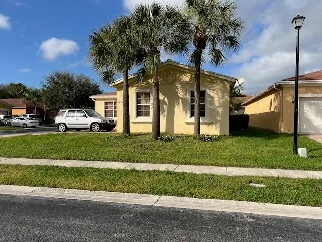 Side of house outside - Copy at 5845 Gypsum Place, West Palm Beach