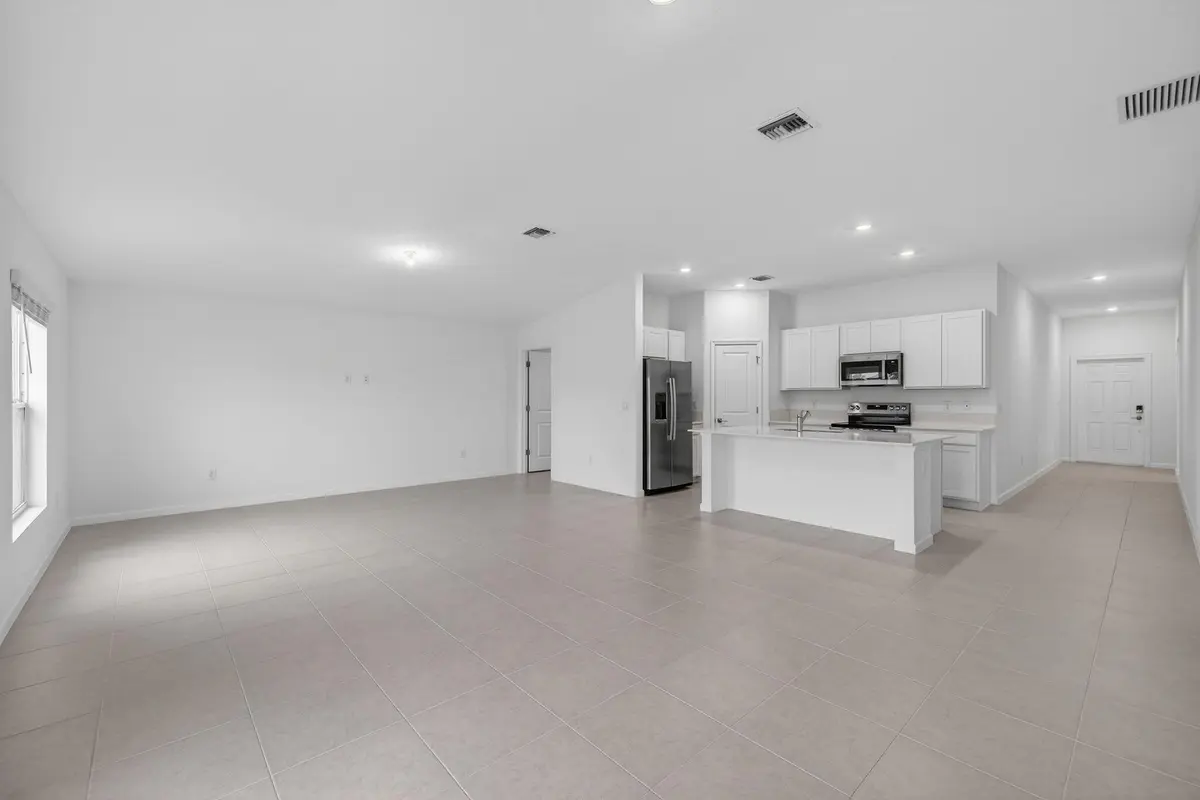 Kitchen - Dining - Living view at 748 Carlyle Way, Fort Pierce