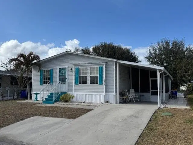 Front of home at 6927 SE Delegate Street, Hobe Sound