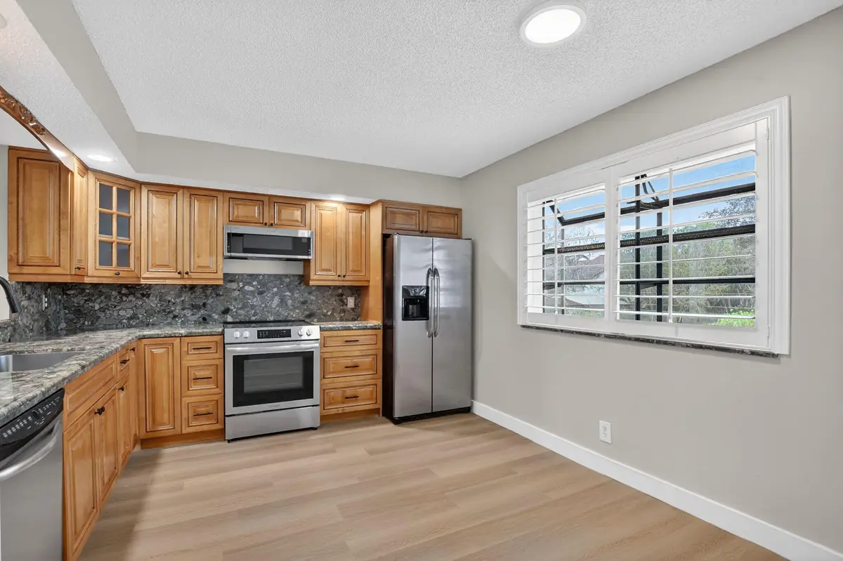 Kitchen and breakfast area at 7818 La Mirada Drive 7818, Boca Raton