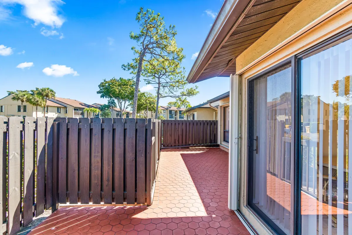 Courtyard at 704 Sunny Pine Way C, Greenacres