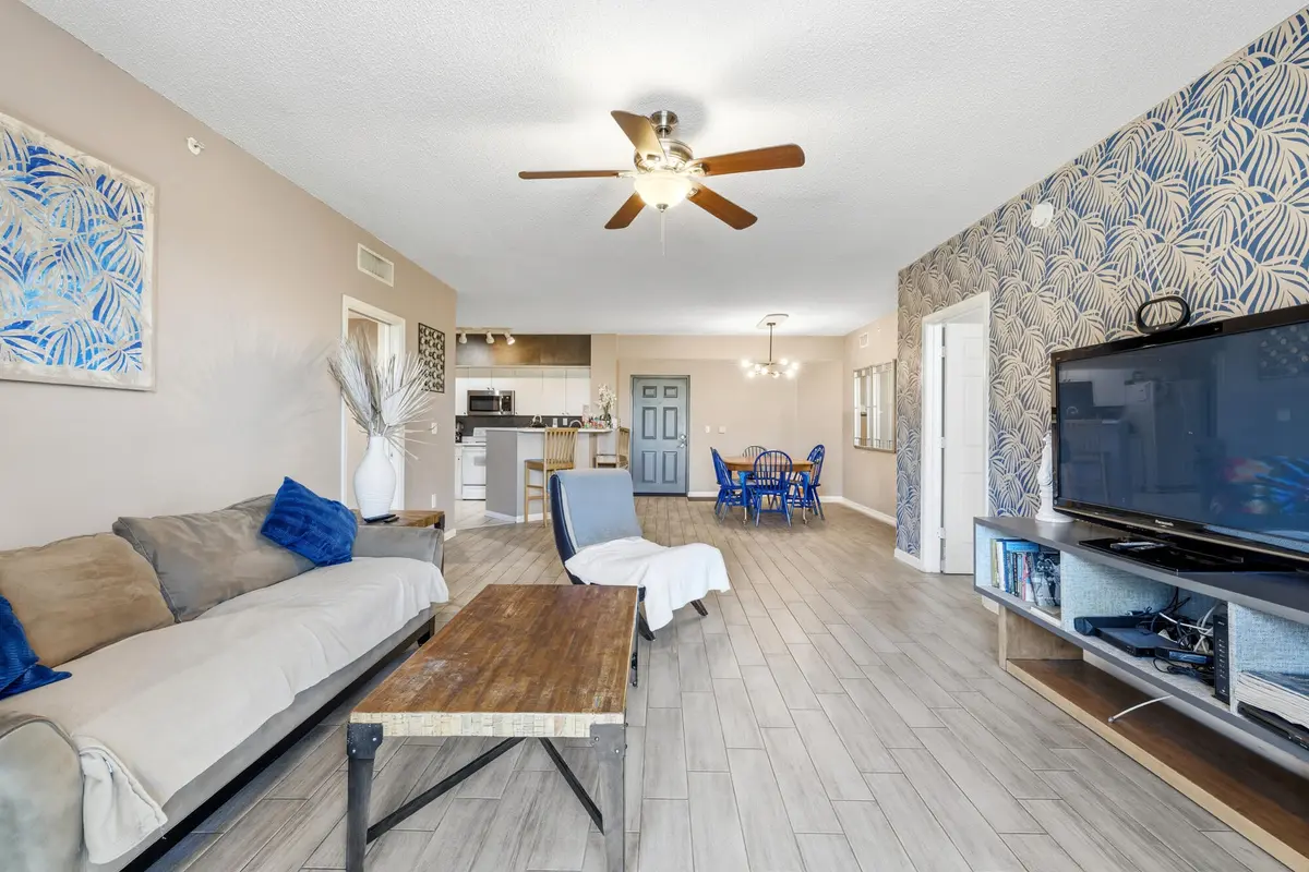 Living room at 11750 Saint Andrews Place 203, Wellington