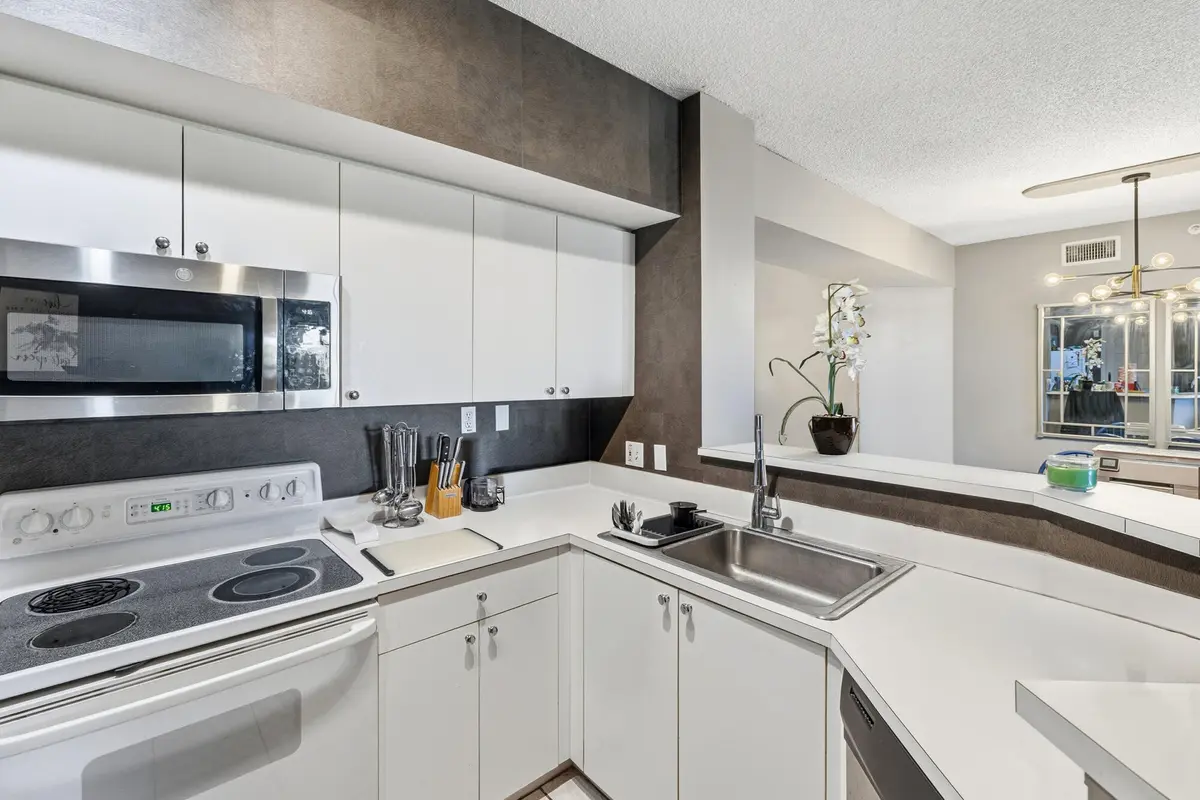 Kitchen at 11750 Saint Andrews Place 203, Wellington