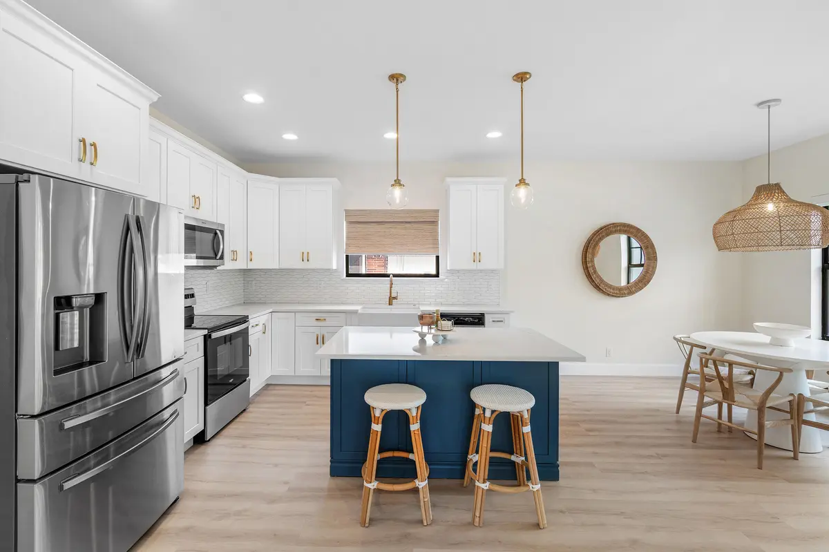 Kitchen Opens to Pool Area at 7606 S Olive Avenue, West Palm Beach