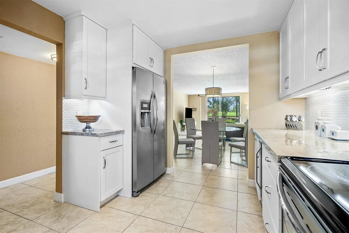 Photo 4 at 2440 Deer Creek Country Club Boulevard 111C, Deerfield Beach