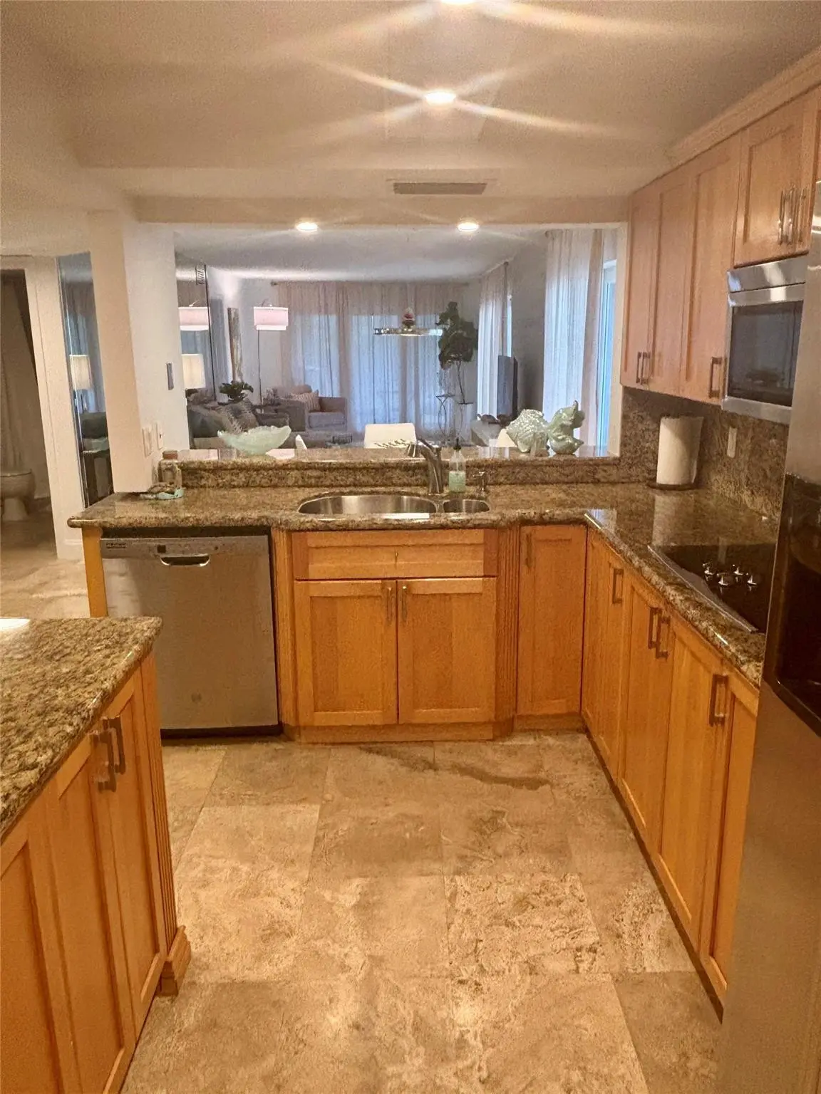 Kitchen w/granite at 10980 S Ocean Drive 114, Jensen Beach