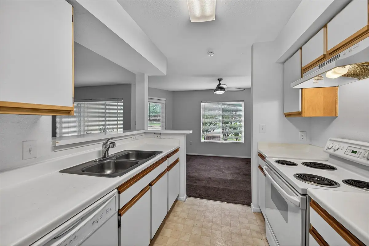 Kitchen looking into Dining Area at 2361 NW 33rd Street 605, Oakland Park
