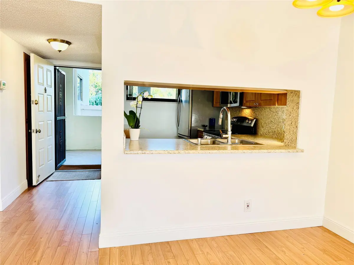 Dining Room at 112 Lake Emerald 206, Oakland Park