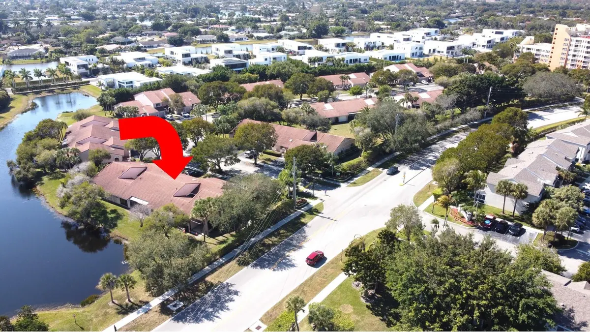 Photo 1 at 16600 Greens Edge Circle 83, Weston