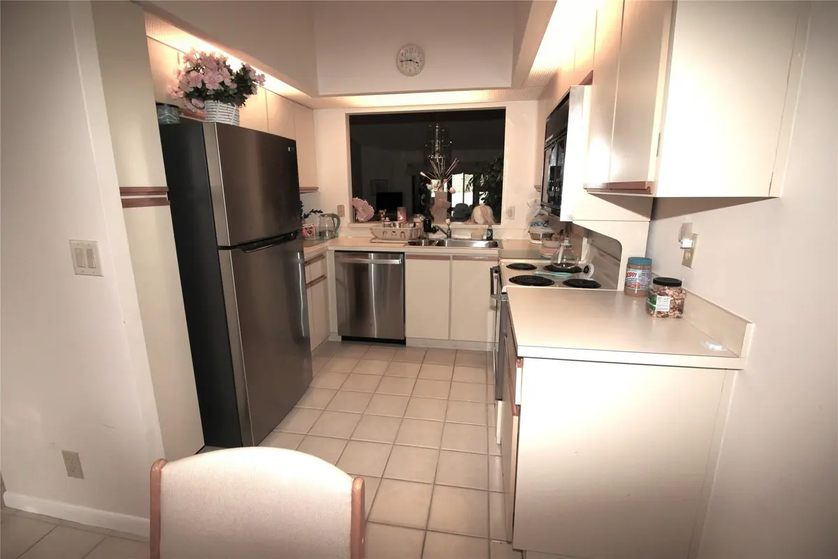 Photo 5 at 16600 Greens Edge Circle 83, Weston