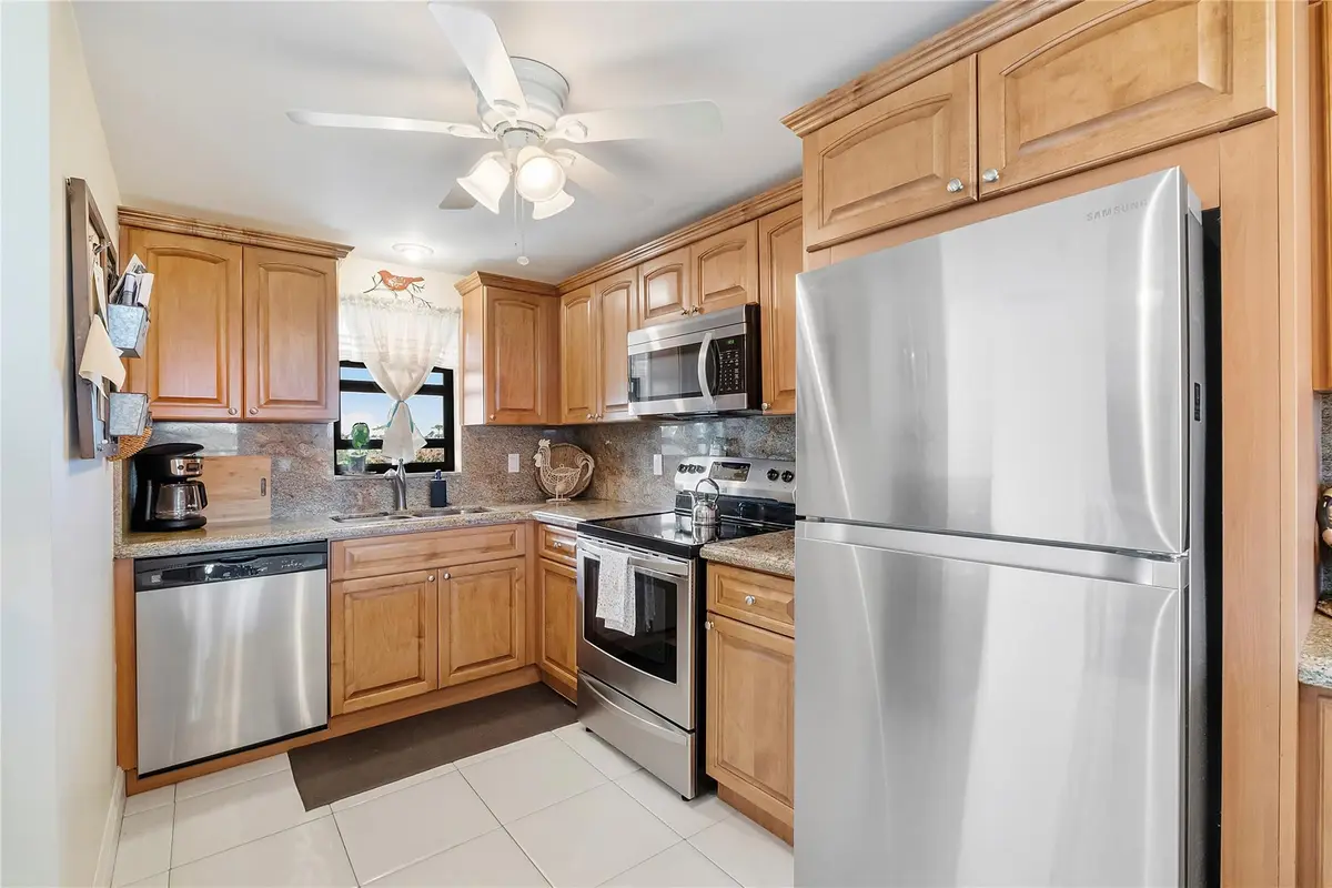 Photo 3 at 2430 Deer Creek Country Club Boulevard 503, Deerfield Beach
