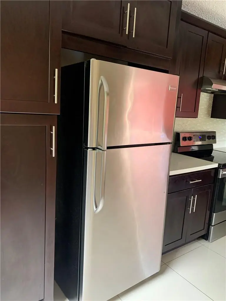 Photo 3 at 8891 Wiles Road 308, Coral Springs