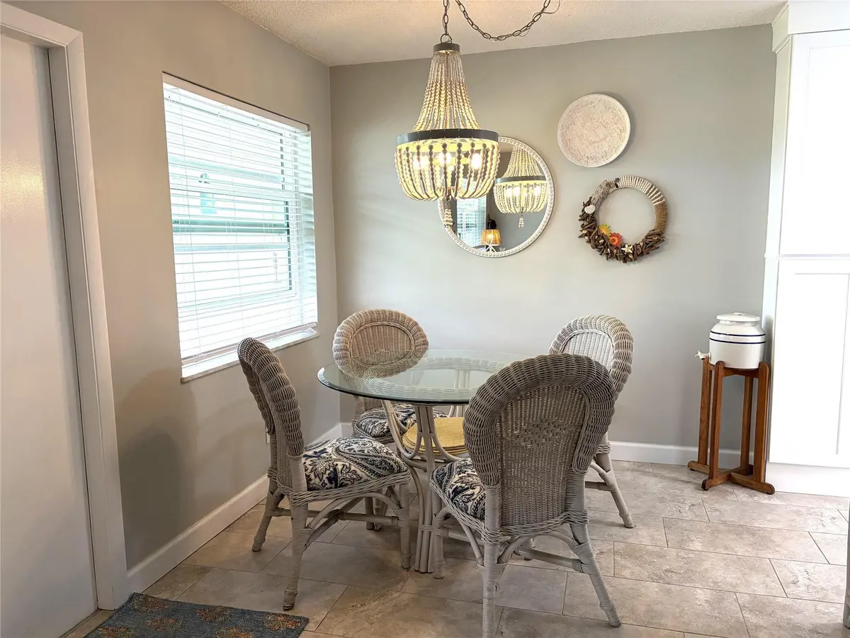 Dining Room at 34 Pine Arbor Lane 203, Vero Beach