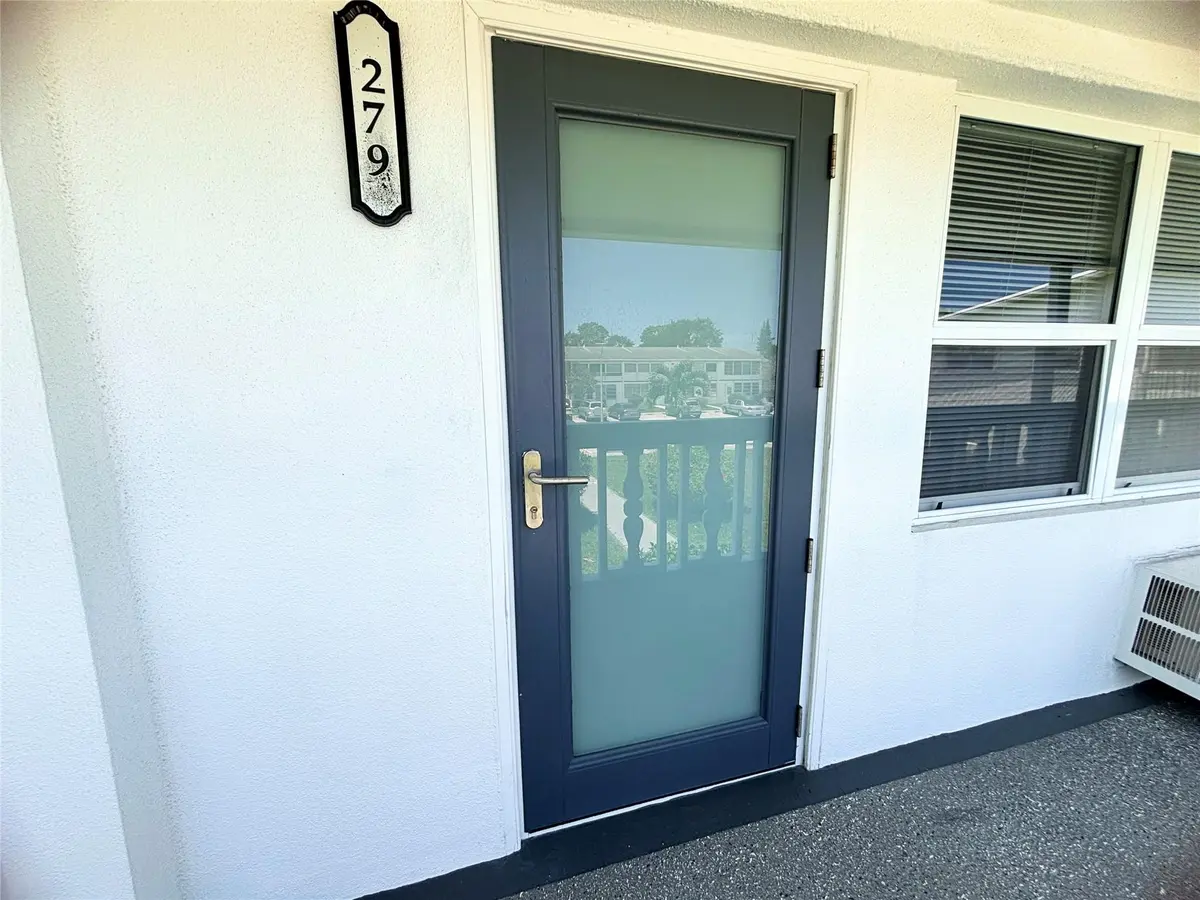 Hurricane Impact Front Door at 279 Oakridge P 279, Deerfield Beach