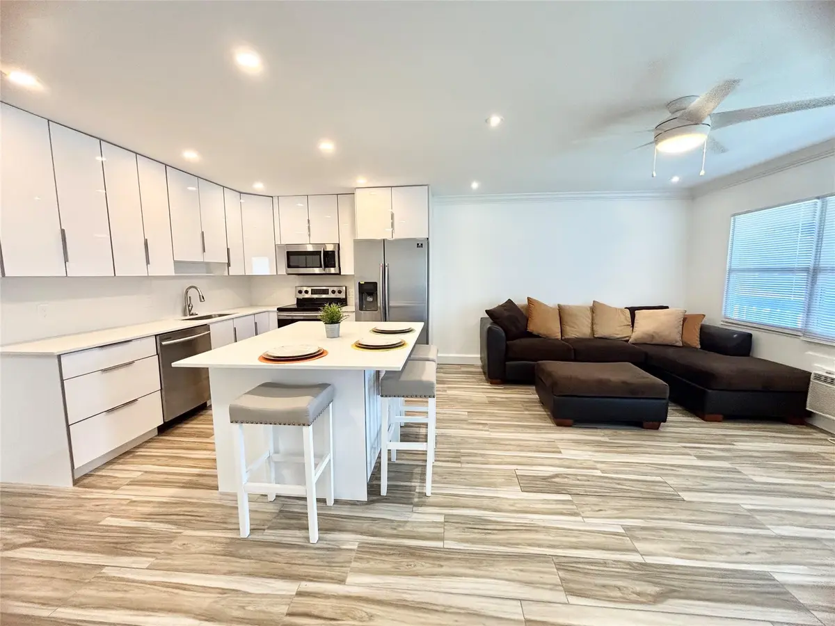 White Cabinets with Extra Storage Space at 279 Oakridge P 279, Deerfield Beach