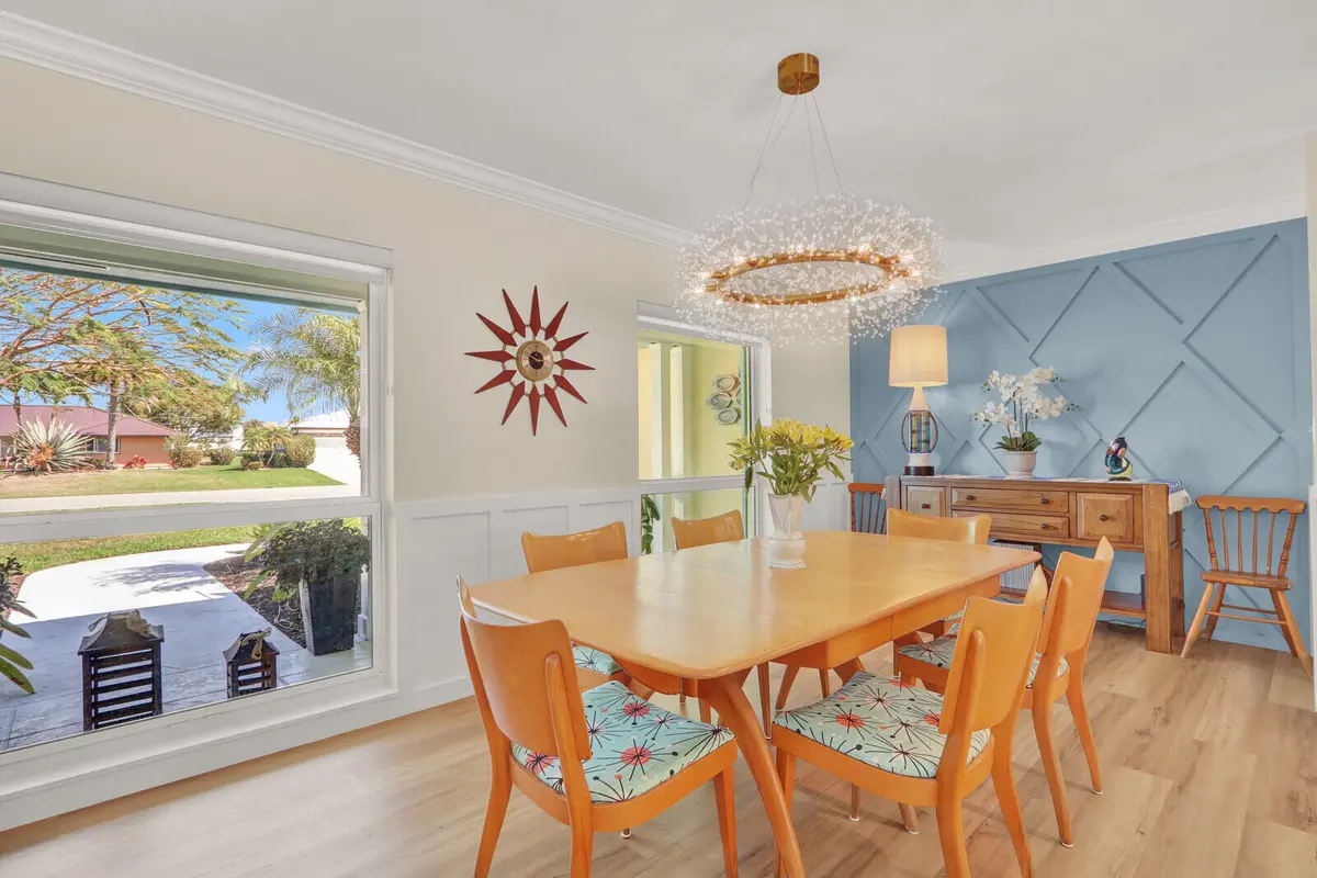 Dining room with a Feature Wall at 225 Orange Tree Drive, Atlantis