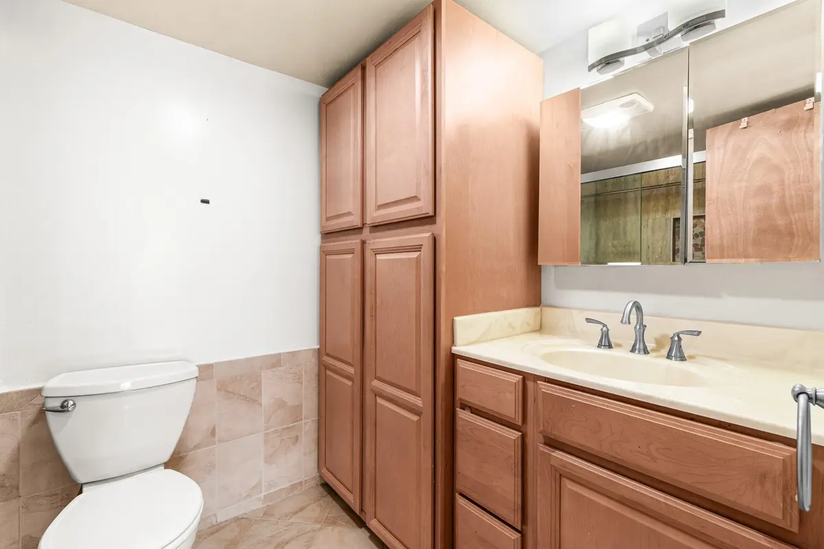 Bedroom.1.Bath.VanityAndStorage026-1020S at 1020 Silk Oak Terrace 102, Delray Beach