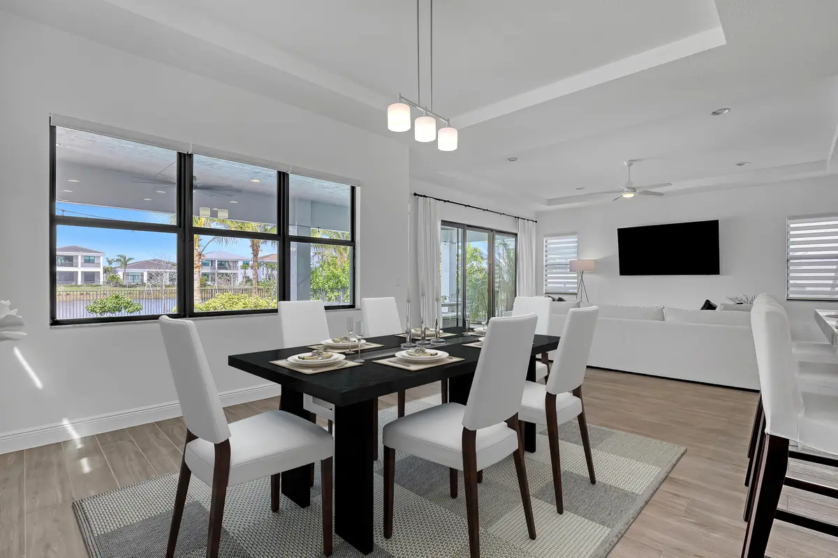 13629 Artisan Dining Room Virtually Stag at 13629 Artisan Circle, Palm Beach Gardens
