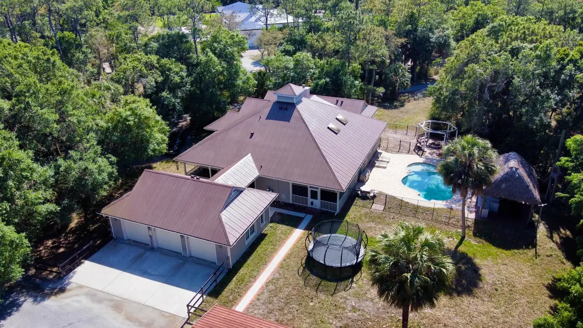 facing West at 18122 Burr Oak Lane, Jupiter