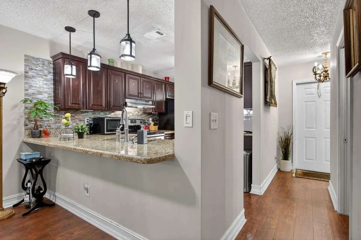 View to Entry and Kitchen at 2122 NE 44th Street, Lighthouse Point