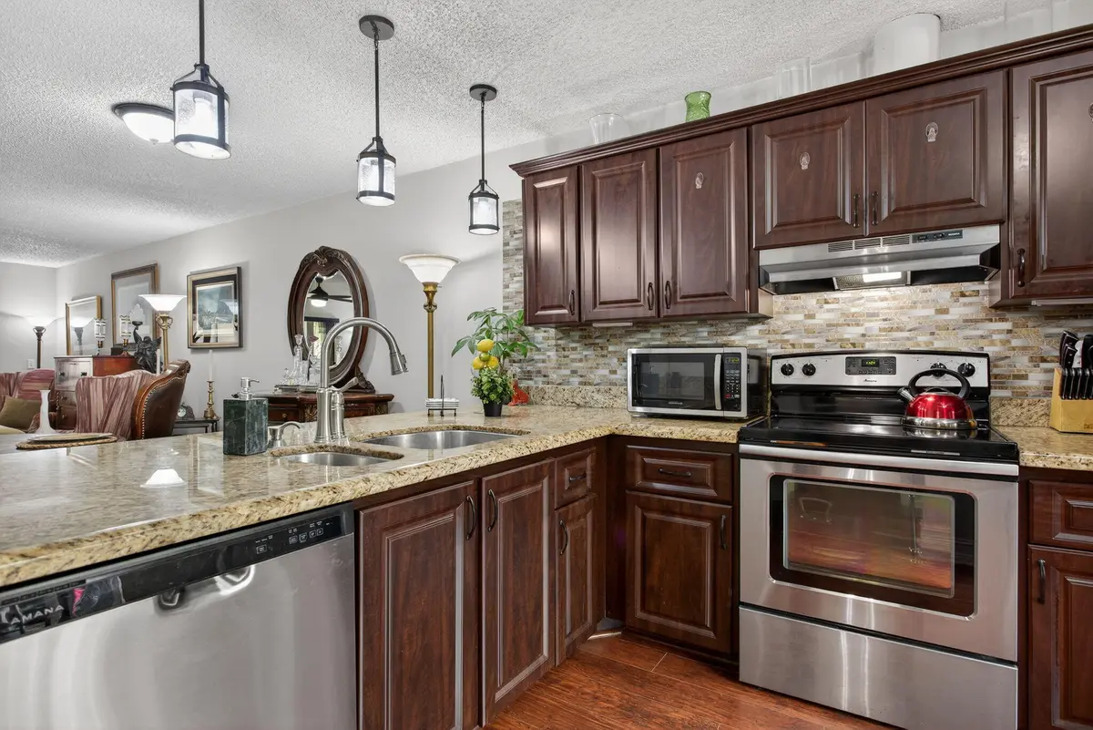 Open Kitchen to Dining and L/R at 2122 NE 44th Street, Lighthouse Point