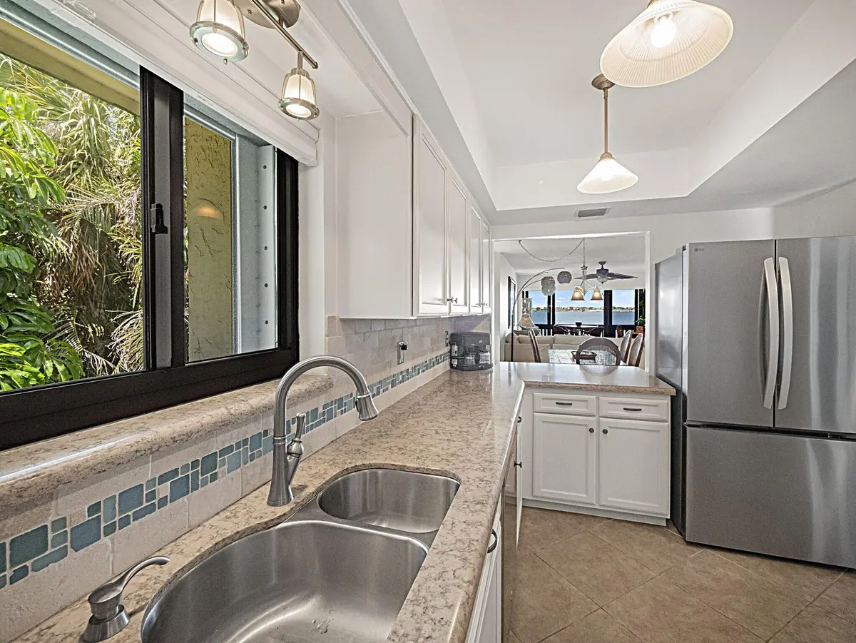 Kitchen with Pass through at 175 SE Saint Lucie Boulevard F116, Stuart