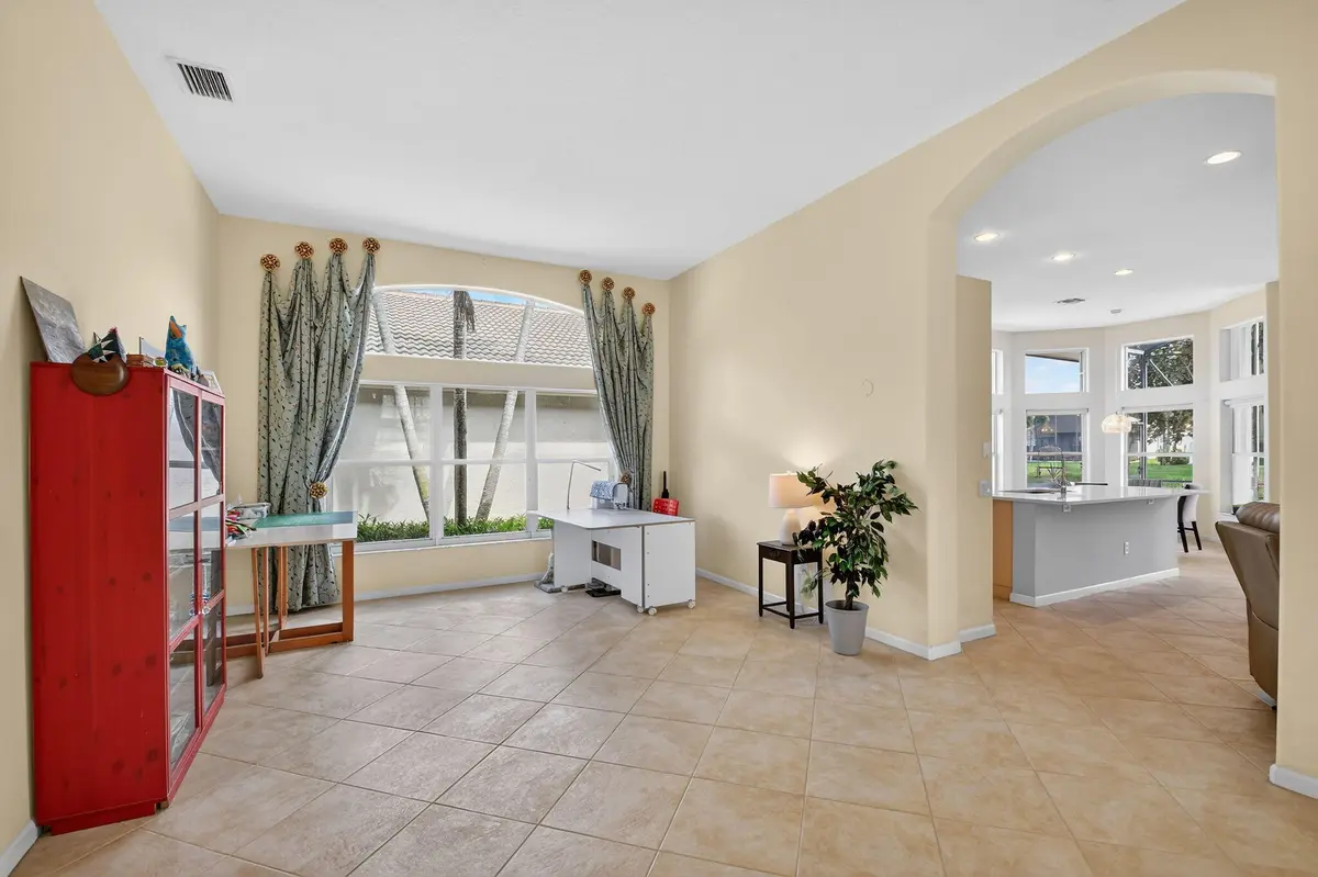 LIVING ROOM USED AS WORKROOM at 7387 Morocca Lake Drive, Delray Beach