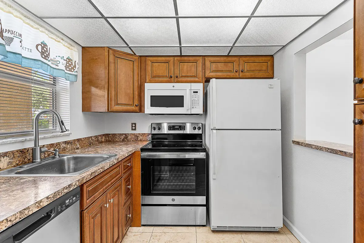 Kitchen at 9855 Sandalfoot Boulevard 305, Boca Raton