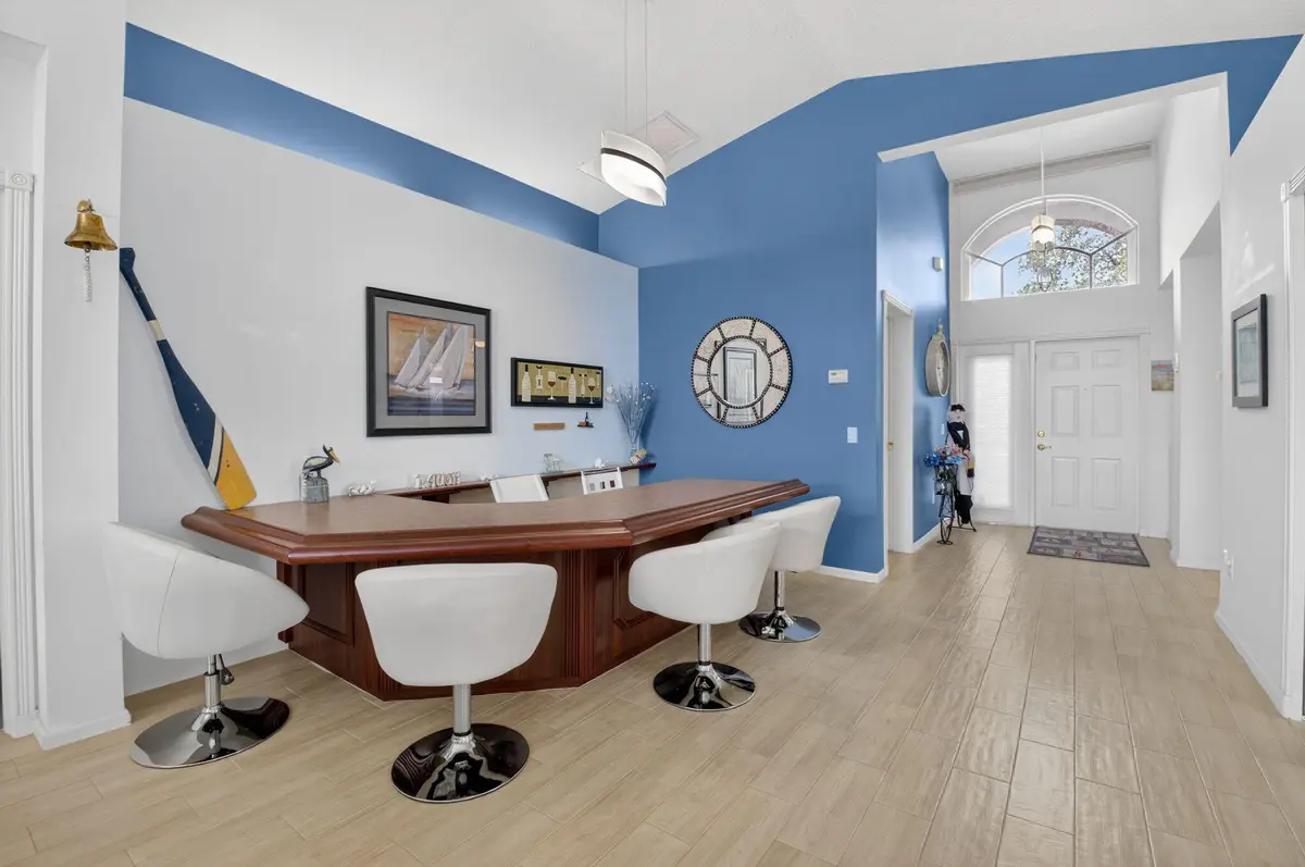 Dining room converted to a bar/lounge at 7094 Avila Terrace Way, Delray Beach