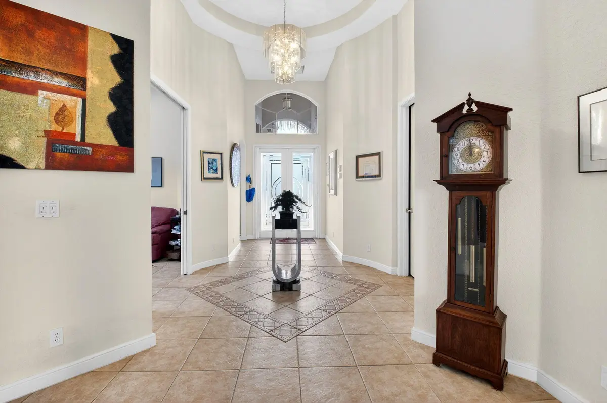 looking toward entrance foyer at 6915 Fairway Lakes Drive, Boynton Beach