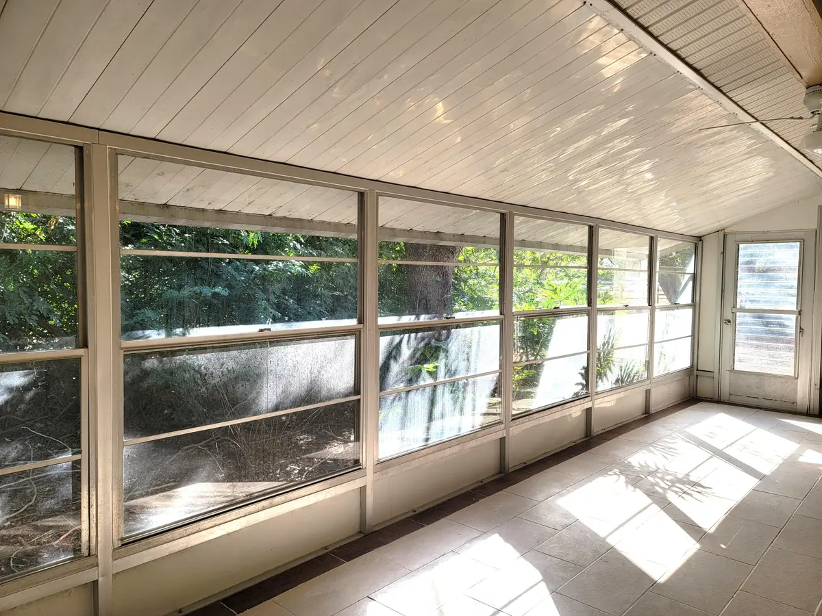 PRIVATE, ENCLOSED PORCH - FRONT OF HOME at 4362 W Midway Road, Fort Pierce