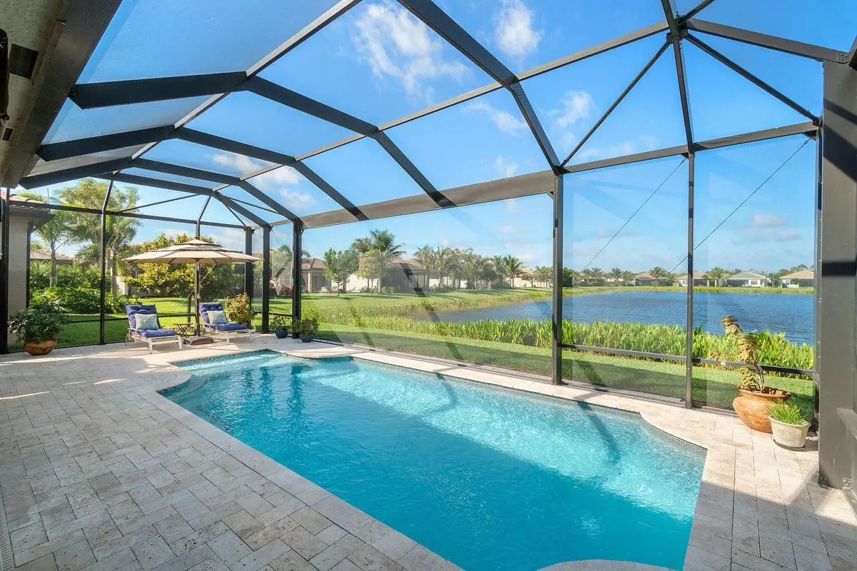 Pool and lake view at 12753 Bonnington Range Drive, Boynton Beach