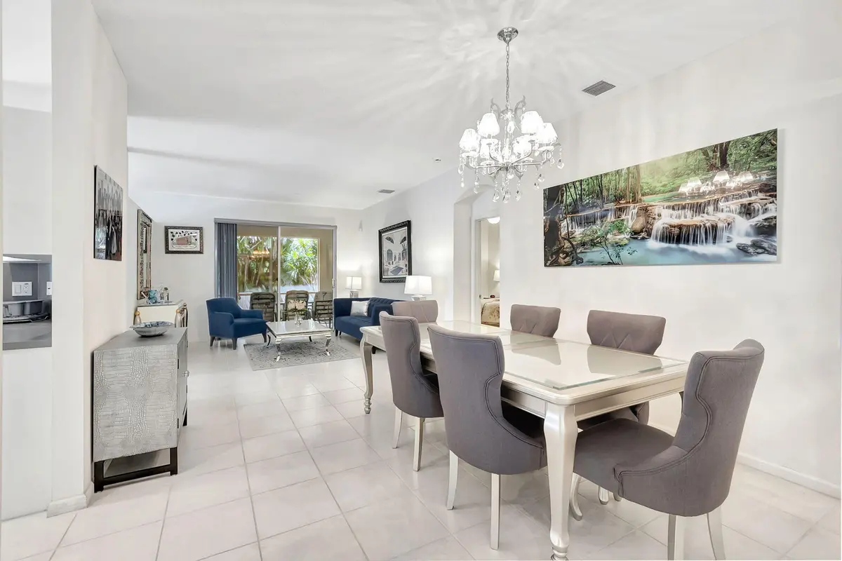 Dining & Living Room Before Painted at 5916 Seashell Terrace, Boynton Beach