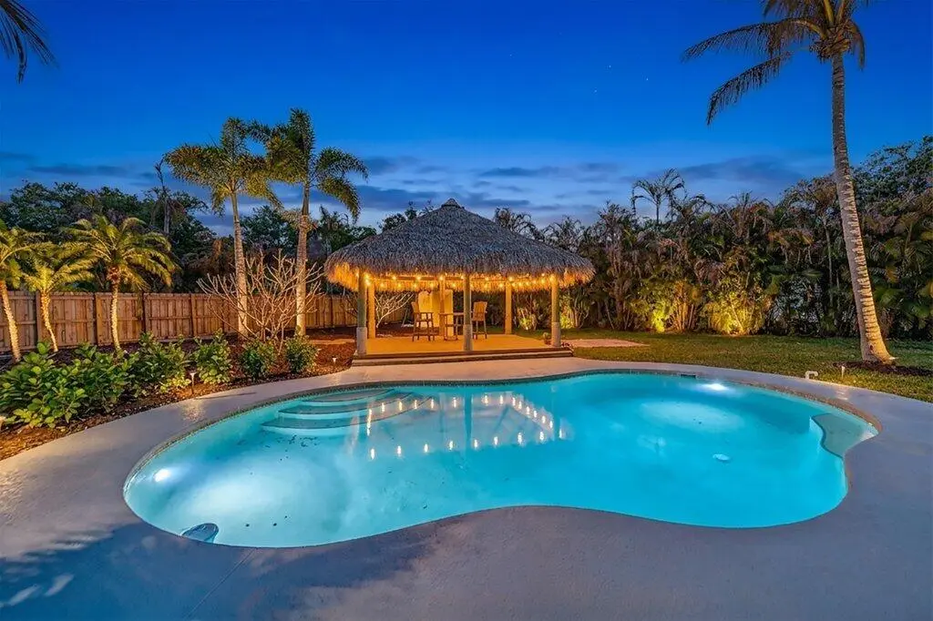 twilightpool1.jpg-SMALL at 2366 SE Country Club Lane, Stuart