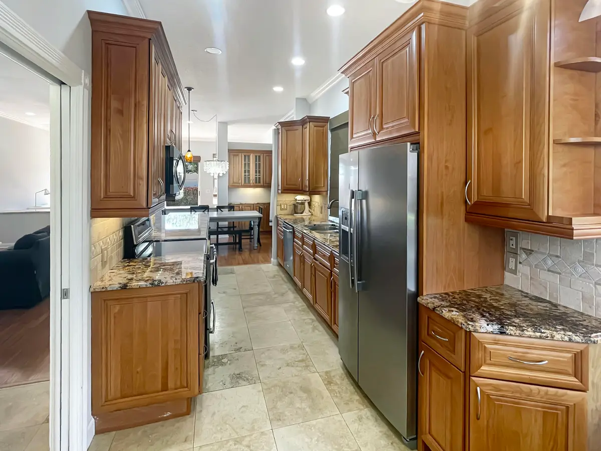 Kitchen from breakfast nook at 2913 SW Brighton Way, Palm City