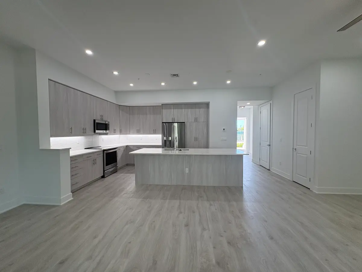 Open Concept Living & Dining at 112 Royal Palm Circle, Tequesta
