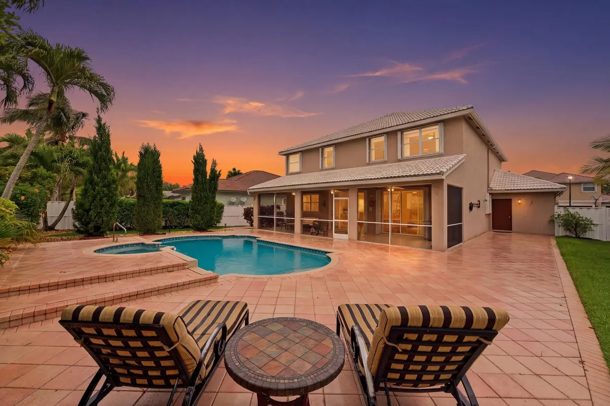 1_063__jjl0348_twilight_8f481b1a at 648 SW 168th Terrace, Pembroke Pines