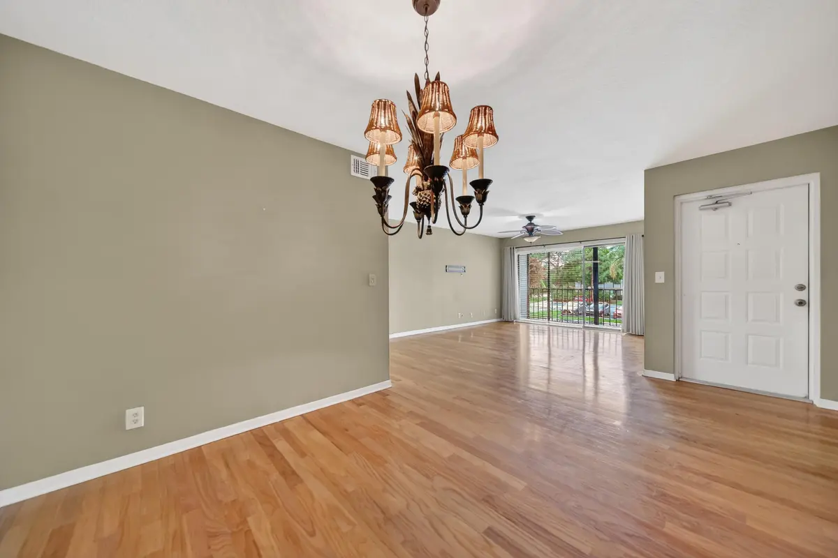 diningliving1.jpg-FULL at 1575 SW Silver Pine Way 108-d2, Palm City