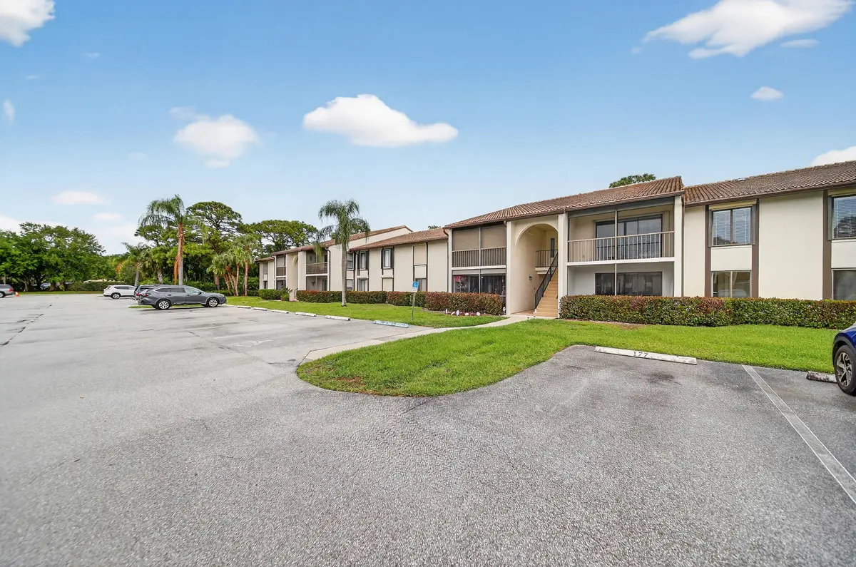 exterior1.jpg-FULL at 1575 SW Silver Pine Way 108-d2, Palm City