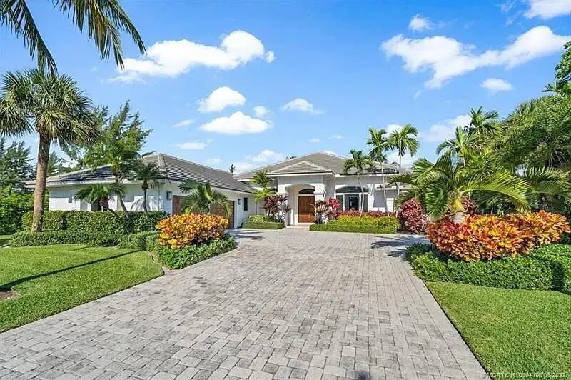 00fafcdc59d5b3a6f73ee891568e6a4f-uncropp at 2941 Lake Drive, Singer Island