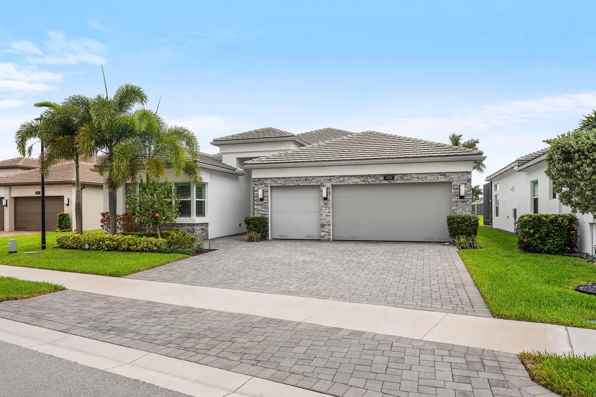 Lushly Landscaped Exerior at 12926 Green Guava Avenue, Boynton Beach