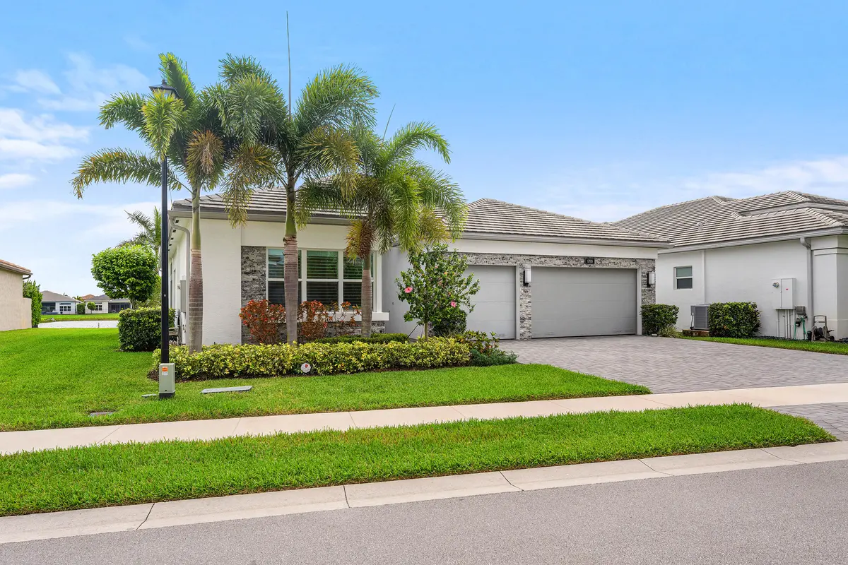 Lushly Landscaped Exerior at 12926 Green Guava Avenue, Boynton Beach