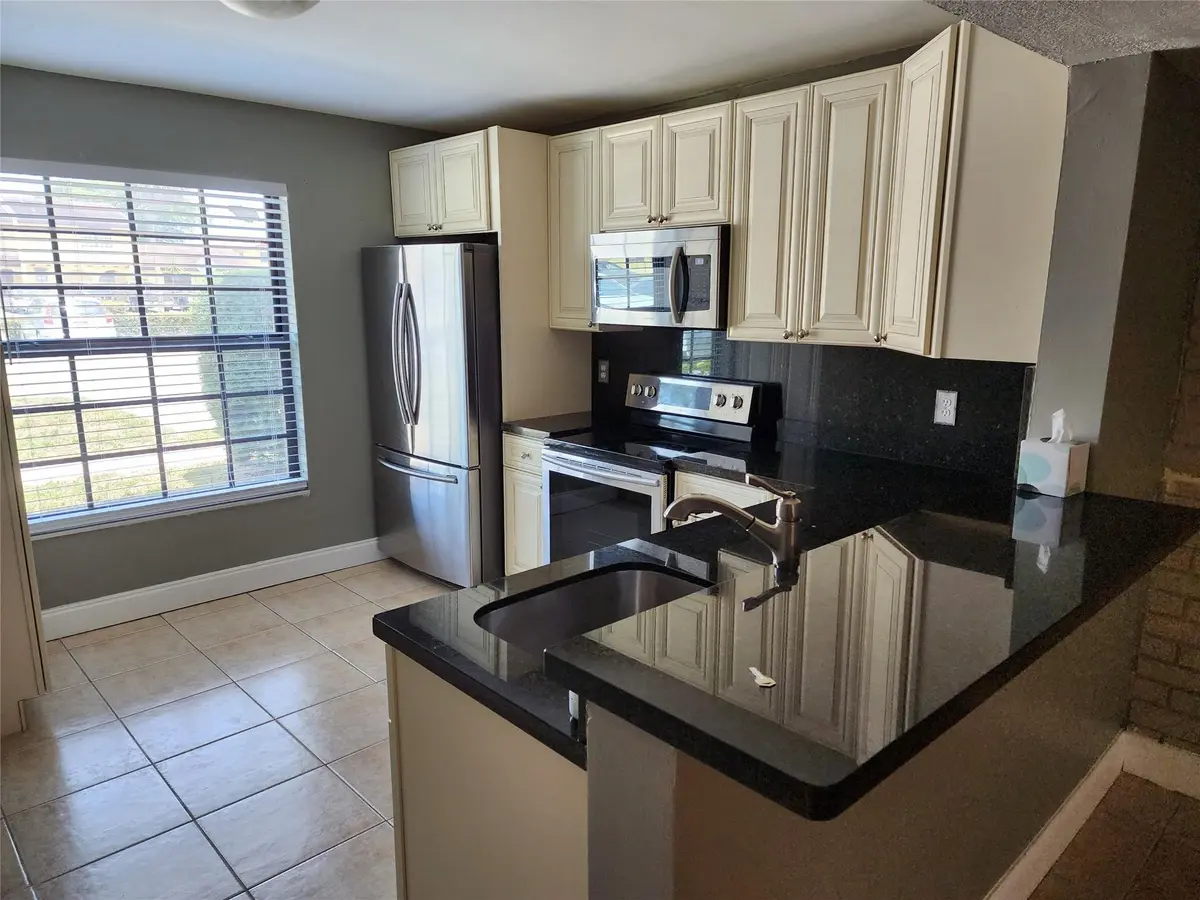 Photo 4 at 2619 NW 47th Lane, Lauderdale Lakes