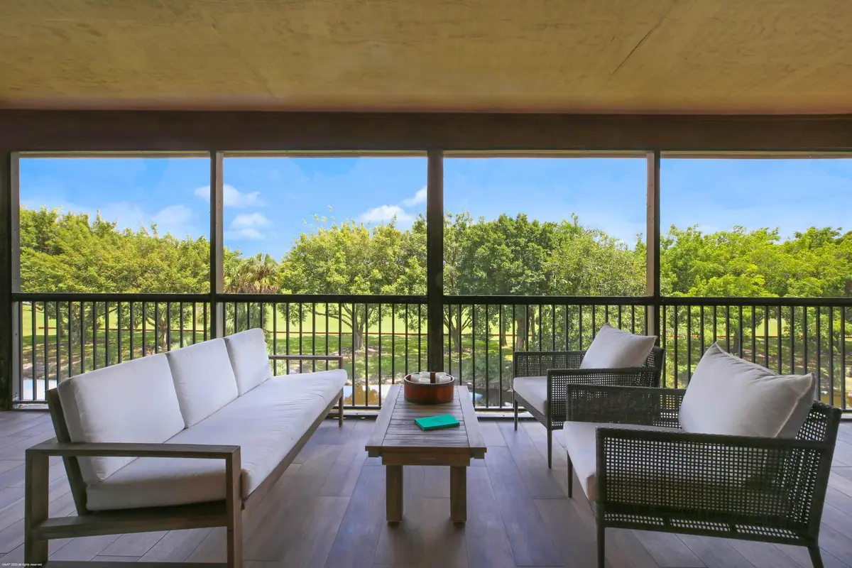 Screened balcony overlooking the water at 2770 Polo Island Drive B301, Wellington