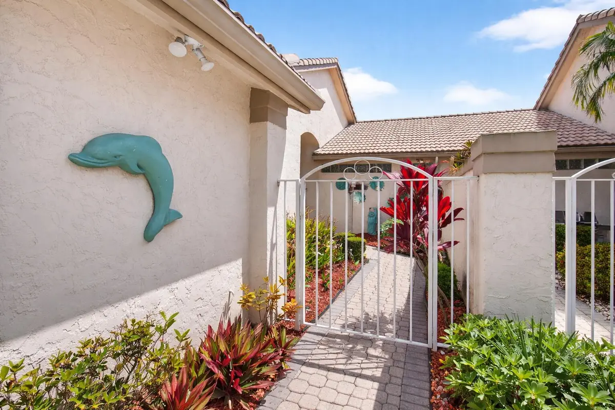 Charming Florida courtyard entrance at 8864 Shoal Creek Lane, Boynton Beach