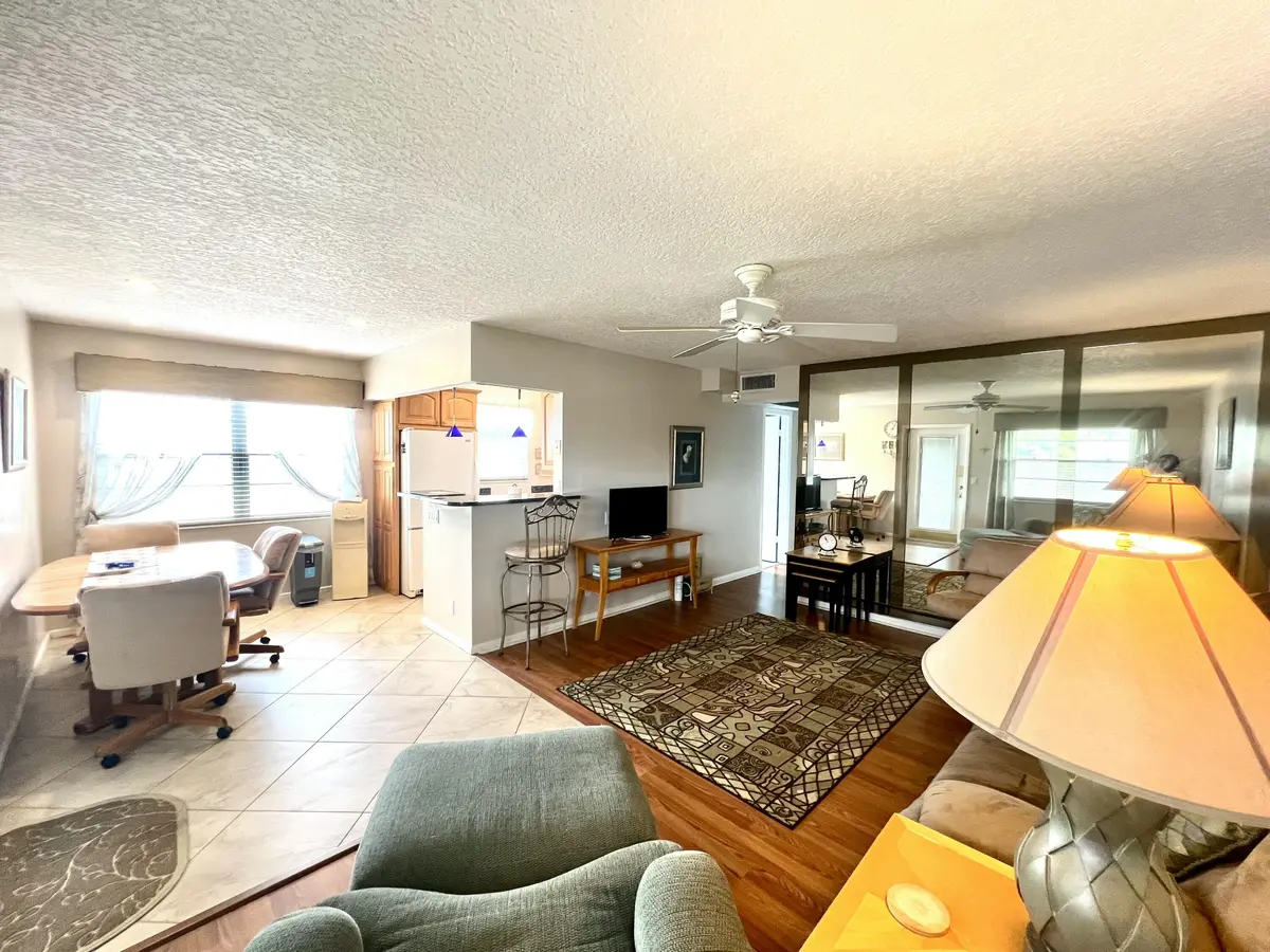 L/R view to dining area/open kitchen at 328 Farnham P, Deerfield Beach