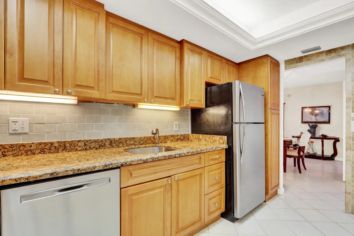 Warm wood finishes at 3450 S Ocean Boulevard 327, Palm Beach
