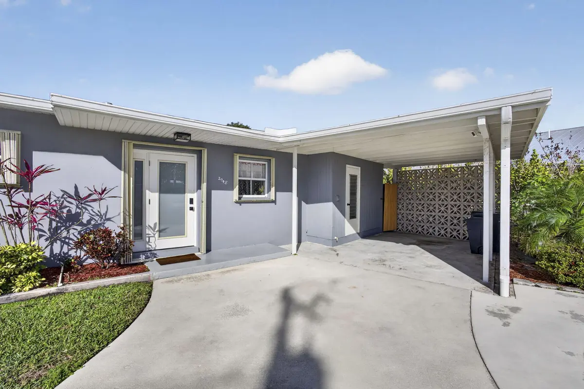 Front Entry/Carport at 2948 SE Treasure Island Road, Port St. Lucie