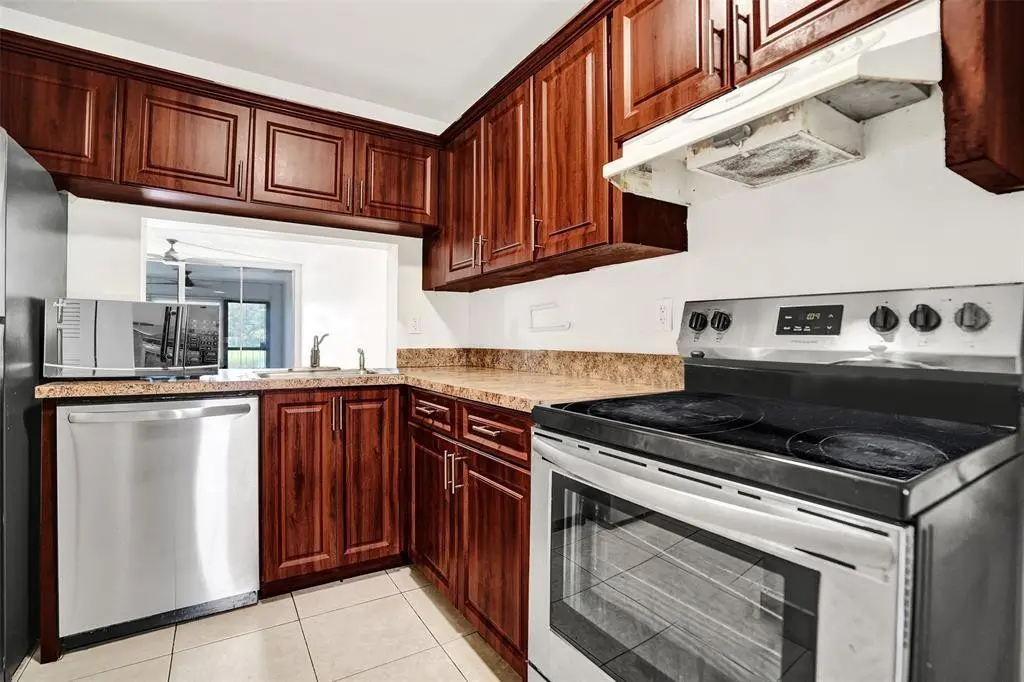 Photo 3 at 9440 Poinciana Place 101, Davie