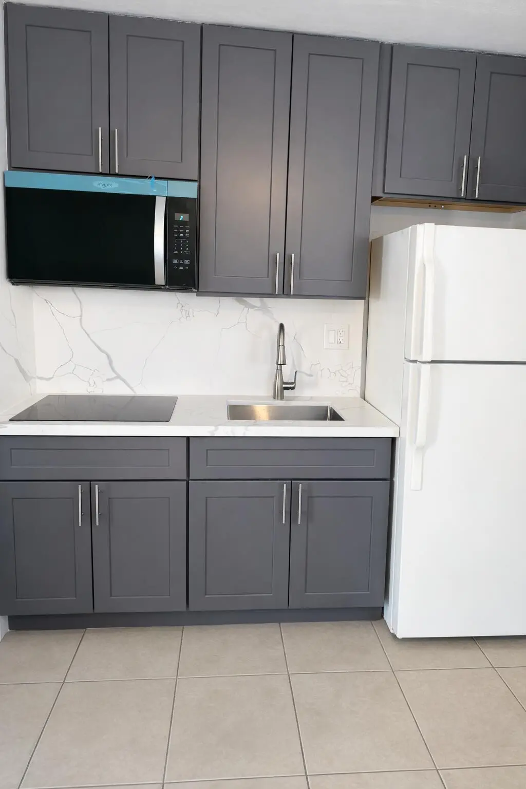 Kitchen 1 at 1017 SE 3rd Street 3, Deerfield Beach